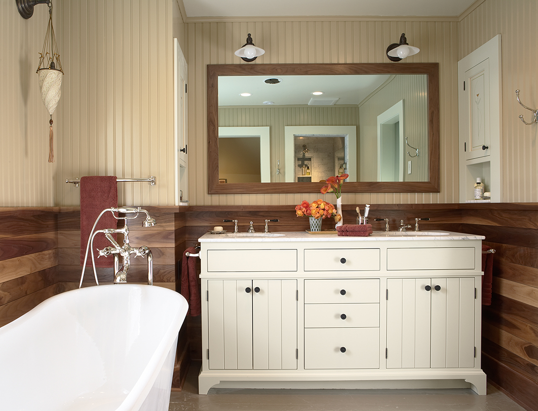 <p>Walnut wainscoting, beadboard, and carrera marble combine to make this a beautiful and unique bathroom. Every effort was made to create a feel of historic authenticity.</p>
