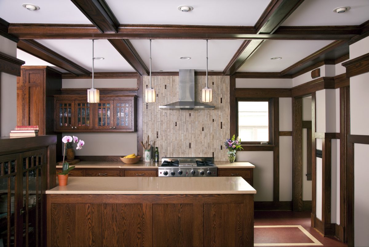 <p>The owners of this 1915 prairie style home desired to expand their kitchen and bring in the authentic old-world detailing of the rest of the home. To this end, the kitchen was opened to the dining area room and a small addition was built. The dining room’s beamed ceiling and prairie style woodwork were carried into the new kitchen and oak cabinets were custom built to match existing woodwork and hutches. This project helped the owners make the most of their home and recaptured its original spirit.</p>
